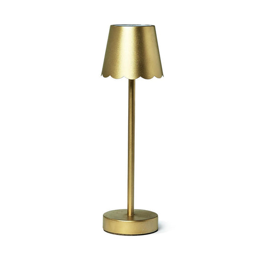 Gold cordless LED table lamp with a metallic finish and elegant scalloped-edge shade on a slim stand.