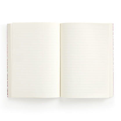 The Liberty London Liberty Nell, Annie and May Premium A5 Notebook is shown open from above, with cream-colored lined and blank pages against a white background.