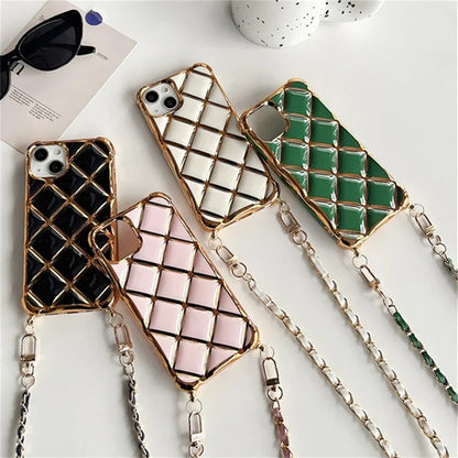 Quilted phone cases with chain straps.