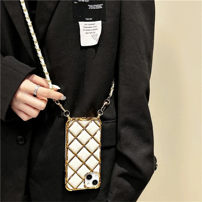 Quilted phone case with chain strap.