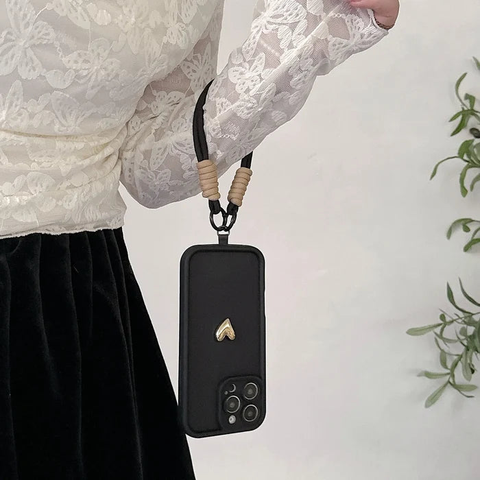 Black phone case with lanyard.