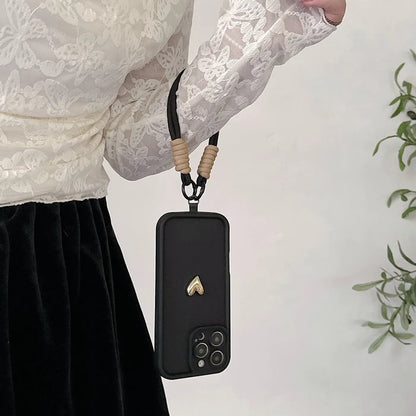Black phone case with lanyard.