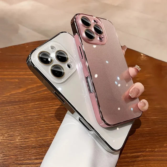 Two iPhones in clear protective cases, one with a silver frame and the other with a pink frame.