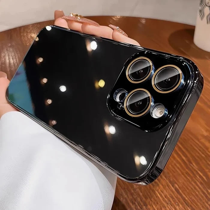 Glossy black smartphone with three camera lenses and gold accents.