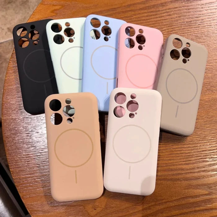 A collection of colorful silicone phone cases with camera cutouts and a circular magnetic charging ring.