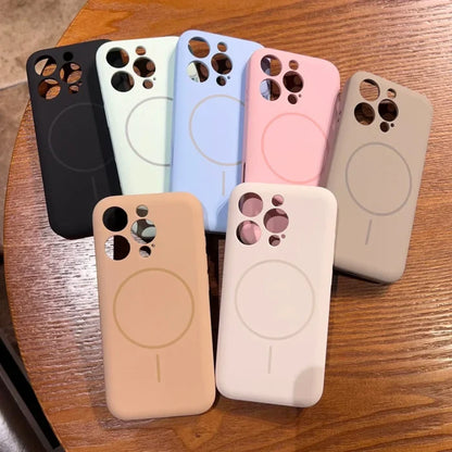 A collection of colorful silicone phone cases with camera cutouts and a circular magnetic charging ring.