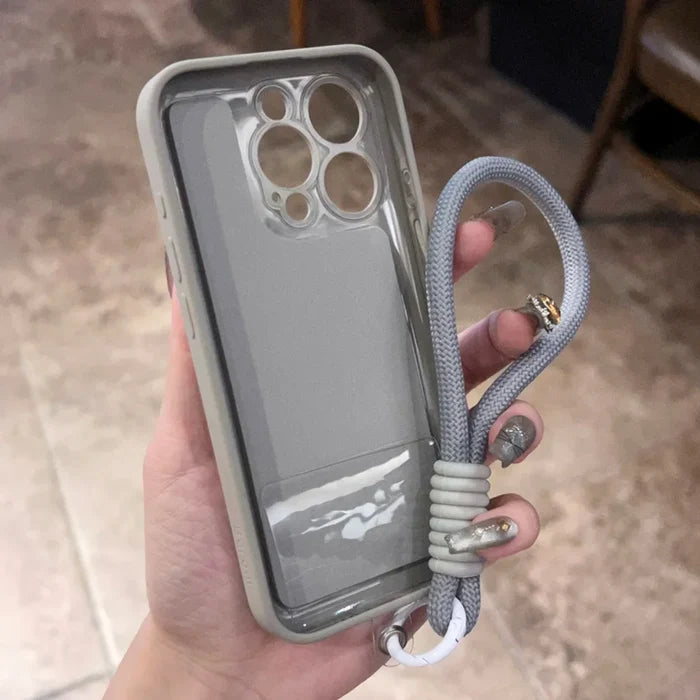 A grey iPhone case with a matching lanyard.