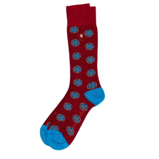 Burgundy Peruvian Pima cotton socks featuring a blue floral pattern with contrasting blue heel and toe.