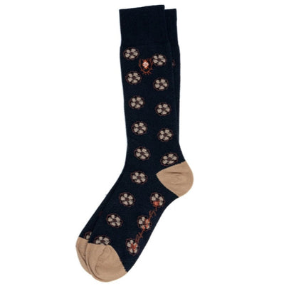 Navy blue Martin Dingman Peruvian Pima cotton socks with a tan heel and toe and a refined floral pattern.