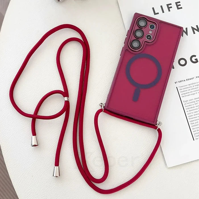 Burgundy phone case with a red cord strap.