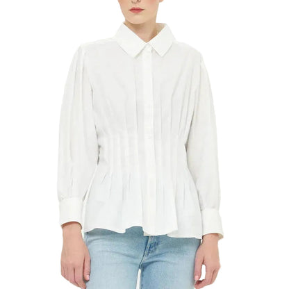 White cotton Oliphant Elizabeth top featuring a collared button-down design with a pleated, waist-defining bodice.