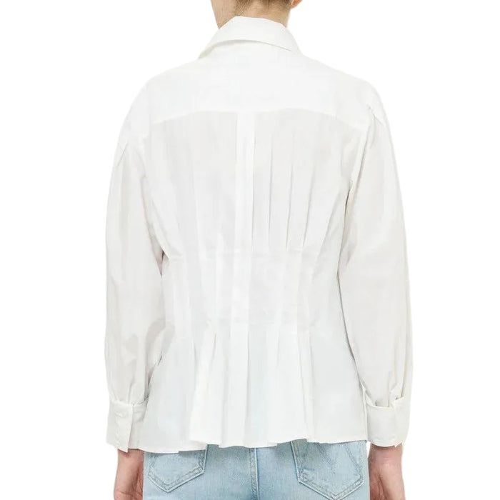 Back view of a white cotton Oliphant Elizabeth top featuring a pleated bodice and long sleeves with buttoned cuffs.
