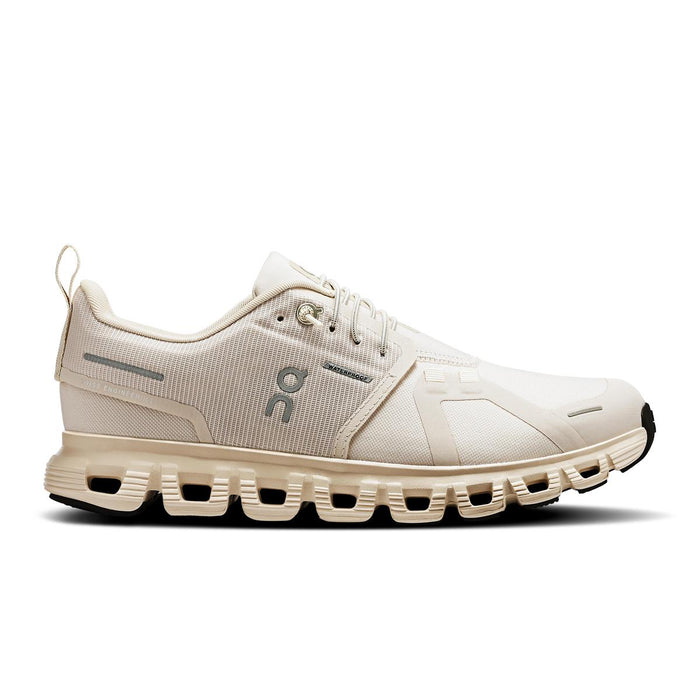 Beige On Running Cloud 6 waterproof women's sneaker with a mesh upper, speed-lacing system, and cushioned CloudTec sole.