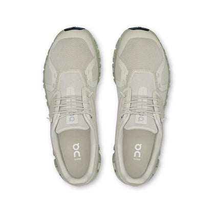 Top-down view of light beige On Running Cloud 6 men's sneakers featuring breathable mesh and speed lacing system.