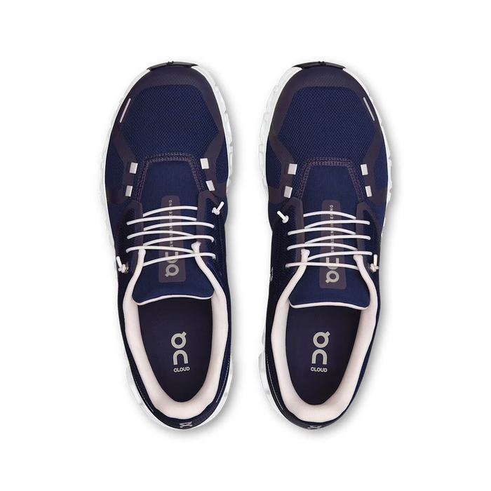 Top-down view of navy blue On Running Cloud 6 men's sneakers with white laces and cushioned CloudTec soles.