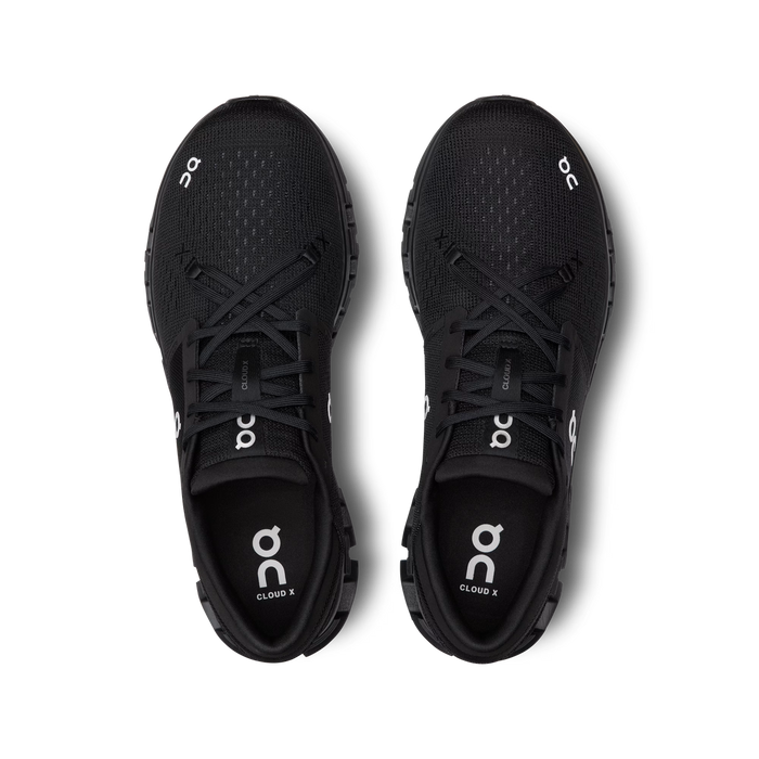 Top-down view of black On Running Cloud X 4 training shoes with breathable mesh uppers and star lacing system.