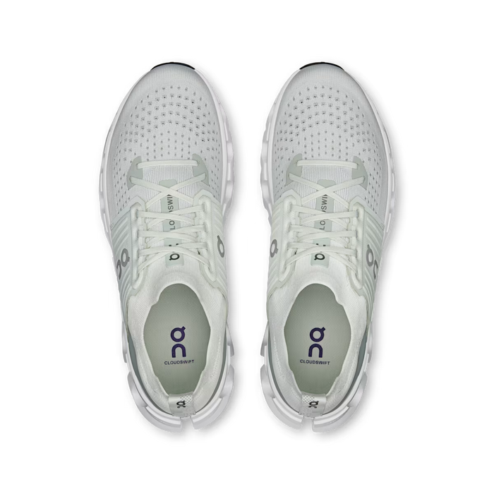 Top-down view of white On Running Cloudswift 4 road shoes featuring a breathable mesh upper and supportive midfoot cage.