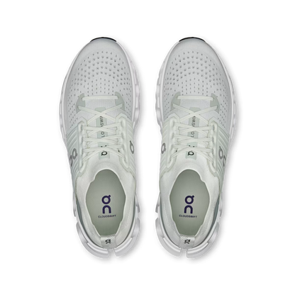 Top-down view of white On Running Cloudswift 4 road shoes featuring a breathable mesh upper and supportive midfoot cage.