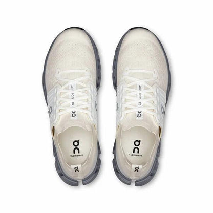 Top-down view of white On Running Cloudswift 4 road shoes with breathable mesh uppers and grey Helion foam midsoles.