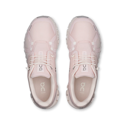 Top view of light pink On Running Women's Cloud 6 sneakers featuring breathable mesh, speed lacing, and CloudTec soles.