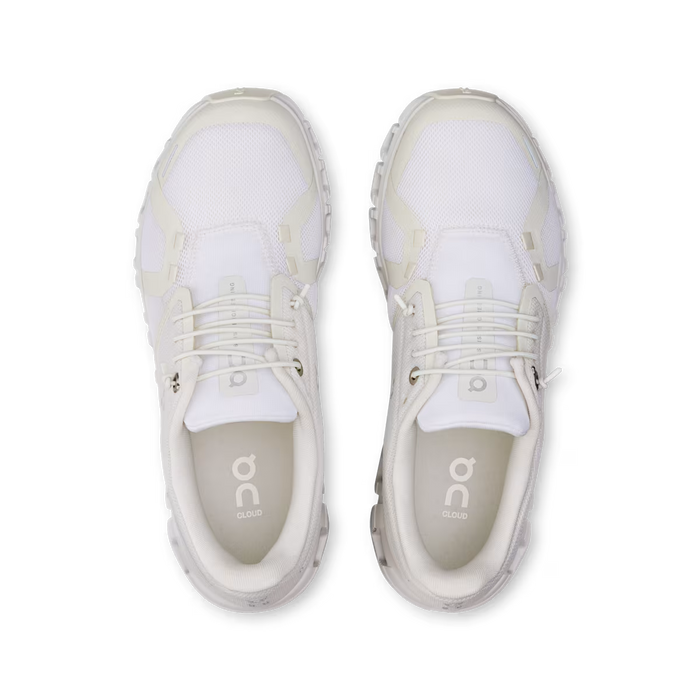 Top-down view of white On Running Women's Cloud 6 sneakers with breathable mesh and signature CloudTec cushioning.