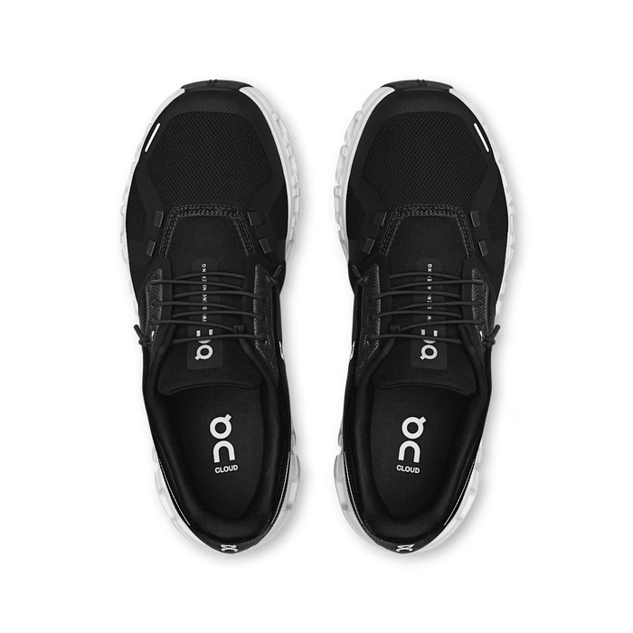 Top-down view of black On Running Women's Cloud 6 sneakers with white CloudTec soles and breathable mesh upper.