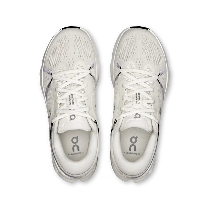 Top-down view of white On Running Women's Cloudsurfer 2 shoes featuring breathable mesh and cushioned midsoles.