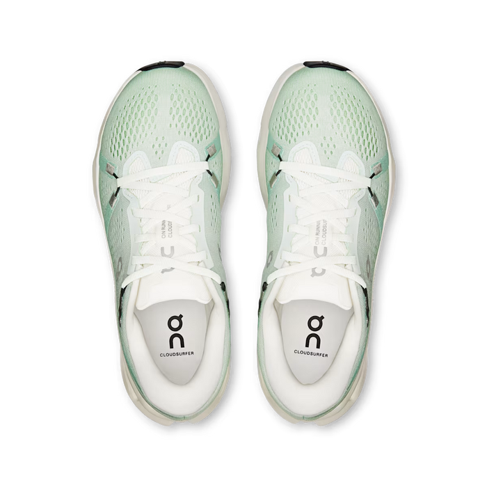 Top-down view of mint green On Running Cloudsurfer 2 women's sneakers with breathable mesh and white laces.