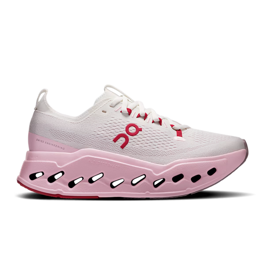 On Running Women's Cloudsurfer Max in white and pink with a thick, cushioned CloudTec Phase sole and breathable mesh upper.