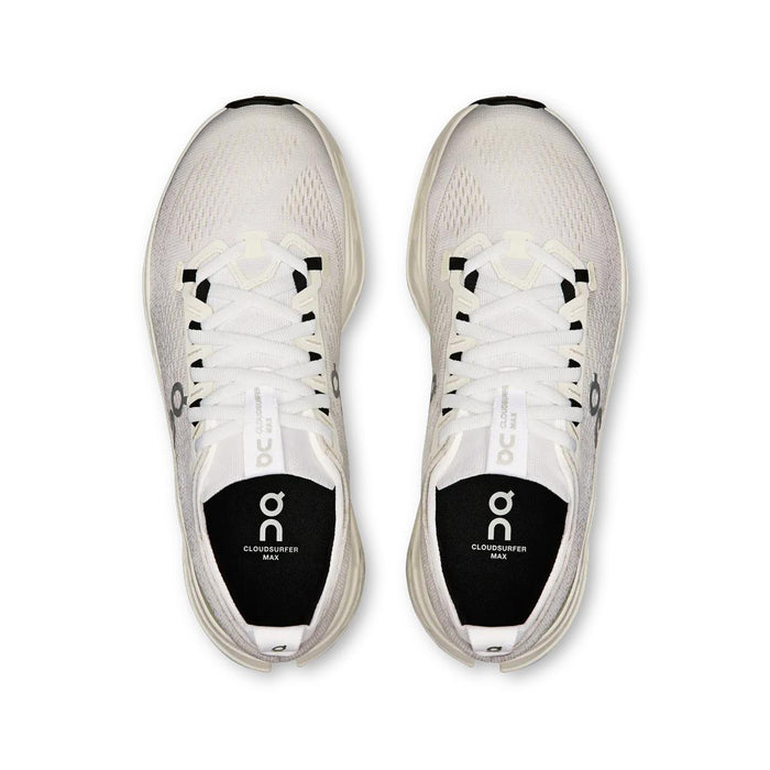 Top-down view of white On Running Cloudsurfer Max women's shoes with a breathable mesh upper and cushioned interior.