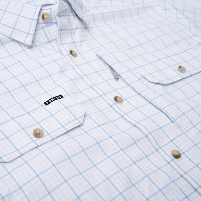 White long-sleeve button-down shirt with a light blue grid pattern, featuring magnetic chest pockets and a Poncho logo tag.