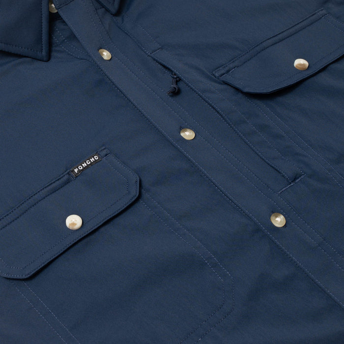 Navy blue Poncho short sleeve performance shirt with magnetic chest pockets and a sunglasses loop.