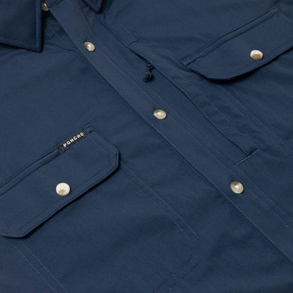 Navy blue Poncho short sleeve performance shirt with magnetic chest pockets and a sunglasses loop.