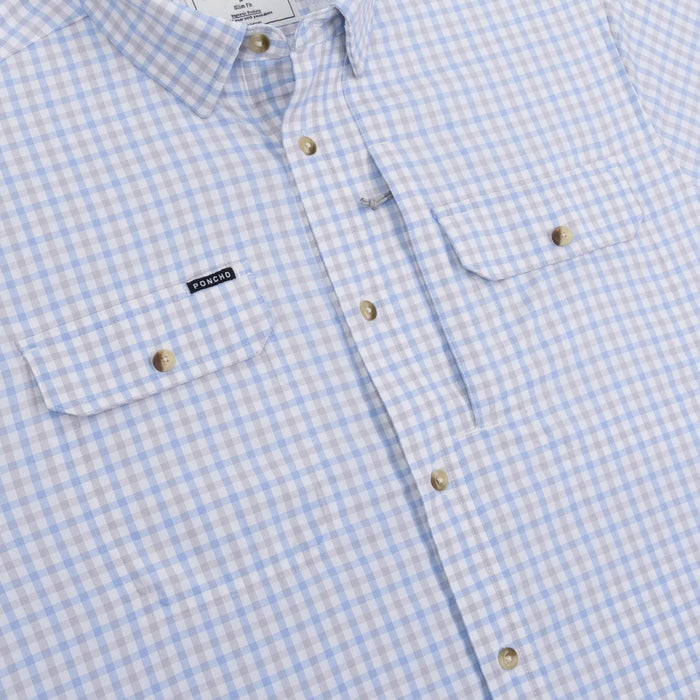 Light blue and white gingham long-sleeve performance shirt with magnetic chest pockets and a Poncho brand logo.
