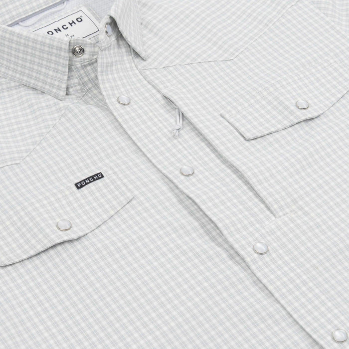 Light grey and white plaid performance western shirt with pearl snaps, two chest pockets, and a Poncho brand label.