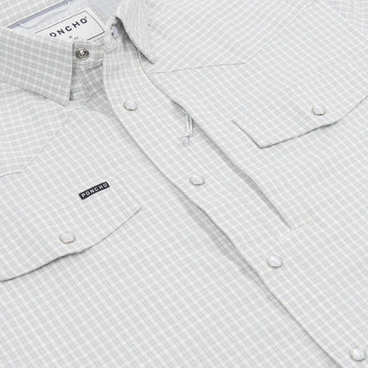 Light grey and white plaid performance western shirt with pearl snaps, two chest pockets, and a Poncho brand label.