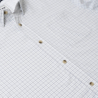 White short-sleeve shirt with a blue grid pattern, featuring a button-down collar, chest pocket, and lightweight fabric.