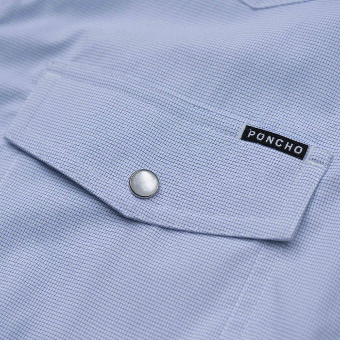 Light blue micro-check western shirt featuring a chest pocket, pearl snap button, and Poncho brand label.