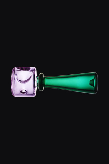A side view of the Pulsar Stacked Geometric Hand Pipe, showing its stacked, geometric design in a vibrant, clear glass finish.
