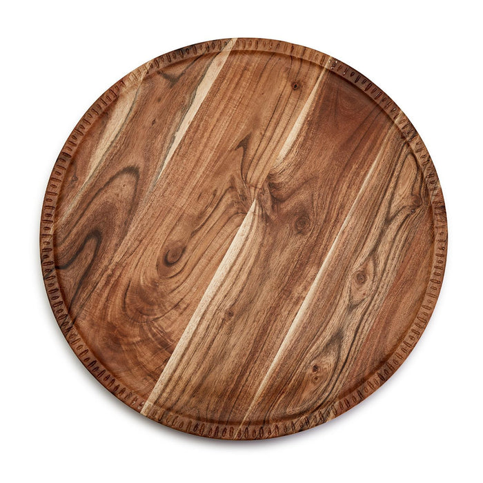 Round 20-inch rotating acacia wood charcuterie board with a natural grain finish and decorative hand-etched edge detail.