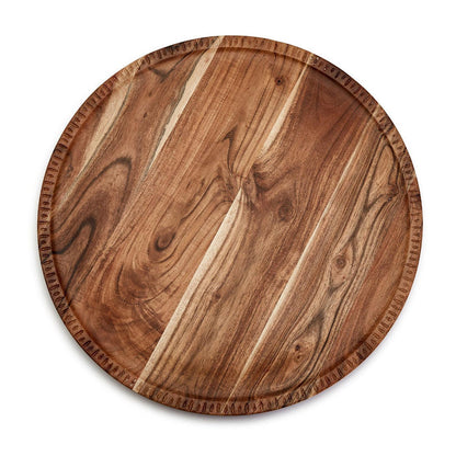 Round 20-inch rotating acacia wood charcuterie board with a natural grain finish and decorative hand-etched edge detail.