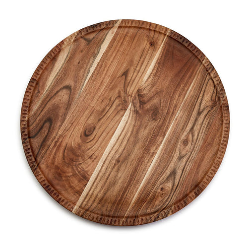 Round 20-inch rotating acacia wood charcuterie board with a natural grain finish and decorative hand-etched edge detail.