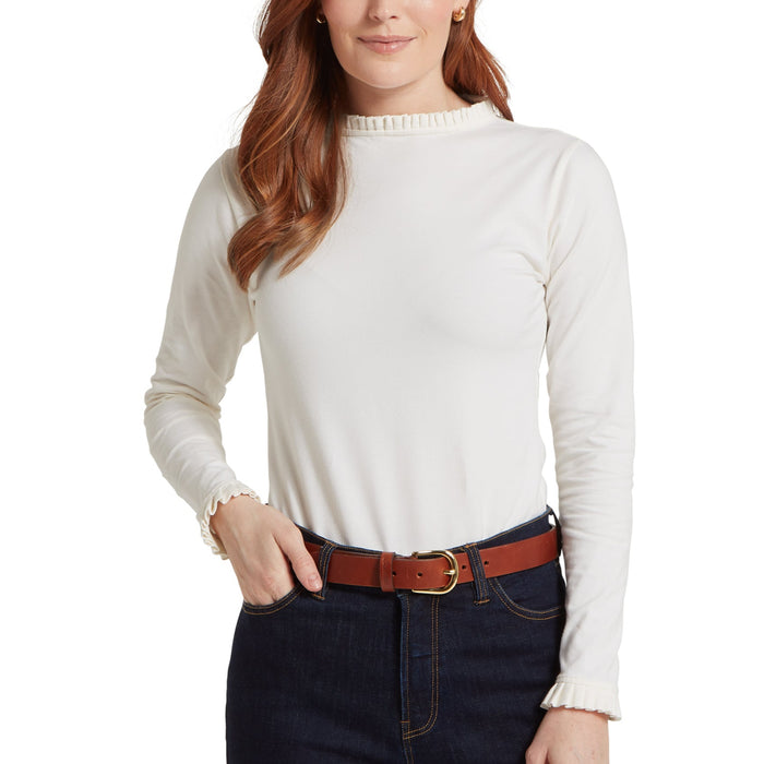 Schoffel women's cream long-sleeve stretch jersey top featuring an elegant frill collar and matching frilled cuffs.