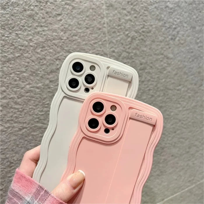 Two wavy-edged phone cases.
