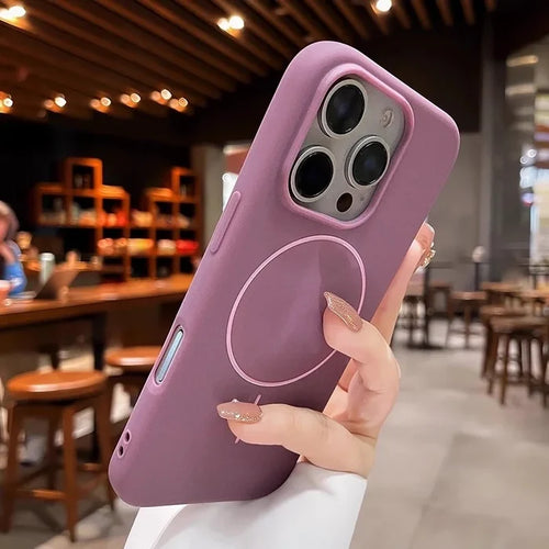 A purple silicone iPhone case with a MagSafe ring.