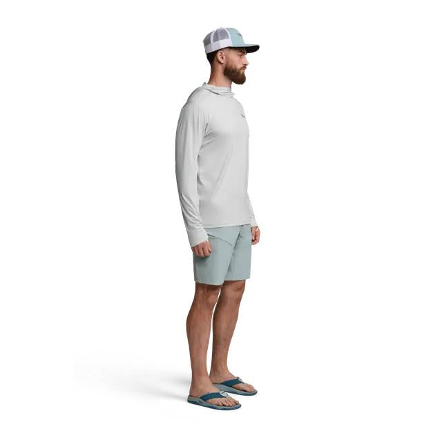 Man wearing a light grey Sitka Guard Sun Hoodie with a hood, long sleeves, and matching shorts on a white background.