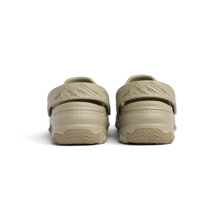 Tan Sitka Ranger Clogs viewed from the back, featuring a mountain logo, adjustable hinge strap, and textured rubber outsoles.