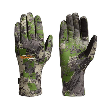 Sitka Traverse gloves in green camouflage print with touchscreen-compatible fingers and a silicone grip palm.