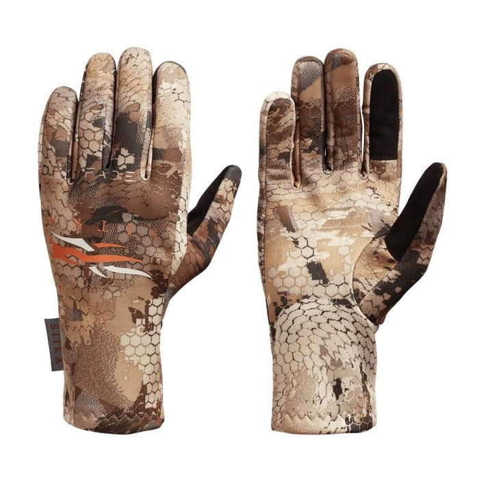 Sitka Traverse gloves in camo print featuring touchscreen-compatible fingertips and a silicone grip palm design.