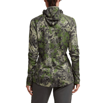 Back view of Sitka women's lightweight camo hoodie with built-in hood and thumb loops in a green pixelated pattern.